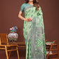 Shree Shyam Fashion Grace in Every Thread: Light green Patola Linen Cotton Saree Woven with Cultural Elegance