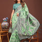 Shree Shyam Fashion Grace in Every Thread: Light green Patola Linen Cotton Saree Woven with Cultural Elegance