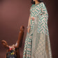 Shree Shyam Fashion Elegant Green & Cream Linen Saree with Geometric Design and Zari Border - Festive & Party Wear