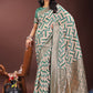 Shree Shyam Fashion Elegant Green & Cream Linen Saree with Geometric Design and Zari Border - Festive & Party Wear