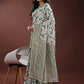 Shree Shyam Fashion Stunning Beige & Green Linen Saree with Floral Print and Rich Zari Pallu - Festive & Traditional Wear