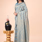 Shree Shyam Fashion Graceful Sky Blue Lichi Silk Saree with Contrast Blue Woven Border & Floral Zari Design - Wedding & Festive Wear