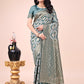 Shree Shyam Fashion Graceful Green Lichi Silk Saree with Contrast Blue Woven Border & Floral Zari Design - Wedding & Festive Wear