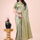 Shree Shyam Fashion Graceful Mehndi Green Lichi Silk Saree with Contrast Blue Woven Border & Floral Zari Design - Wedding & Festive Wear