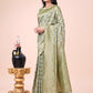 Shree Shyam Fashion Graceful Mehndi Green Lichi Silk Saree with Contrast Blue Woven Border & Floral Zari Design - Wedding & Festive Wear