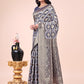 Shree Shyam Fashion Graceful Navy Blue Lichi Silk Saree with Contrast Blue Woven Border & Floral Zari Design - Wedding & Festive Wear