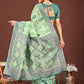 Shree Shyam Fashion Radiant Light Green Linen Cotton Patola Saree - Where Tradition Dances with Elegance