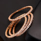Priyaasi Women Set Of 4 Rose Gold-Polished American Diamond Studded Bangles - Noz2Toz