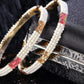Priyaasi Women Set Of 2 Gold-Polished Pearls and Stones Studded Bangles in Pink and White Color - Noz2Toz