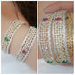 Gold-Polished Alloy American Diamond Broad Multi Bangle Set - The Pari - Swadesiicart