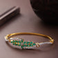 Priyaasi Women Gold-Polished American Diamond and Emerald Studded, Floral Patterned Bracelet in Green Color - Noz2Toz