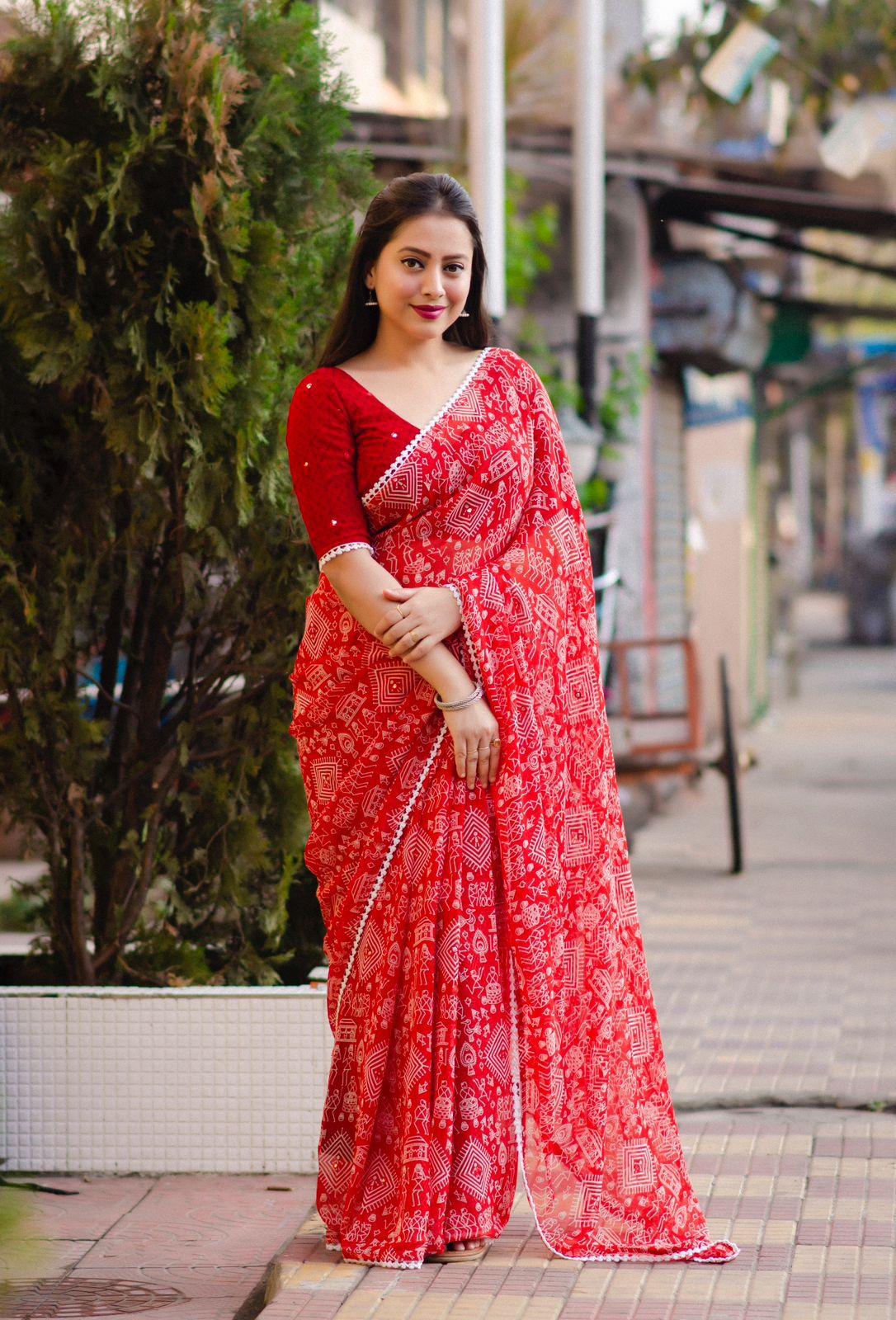 Red Poly Georgette Ethnic Motifs Saree with Unstitched Blouse - Hiral Fashion | Swadesiicart