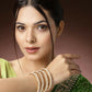 NVR Women's Set of 4 Gold-Polished Pearl Handcrafted Traditional Bangles - Swadesiicart