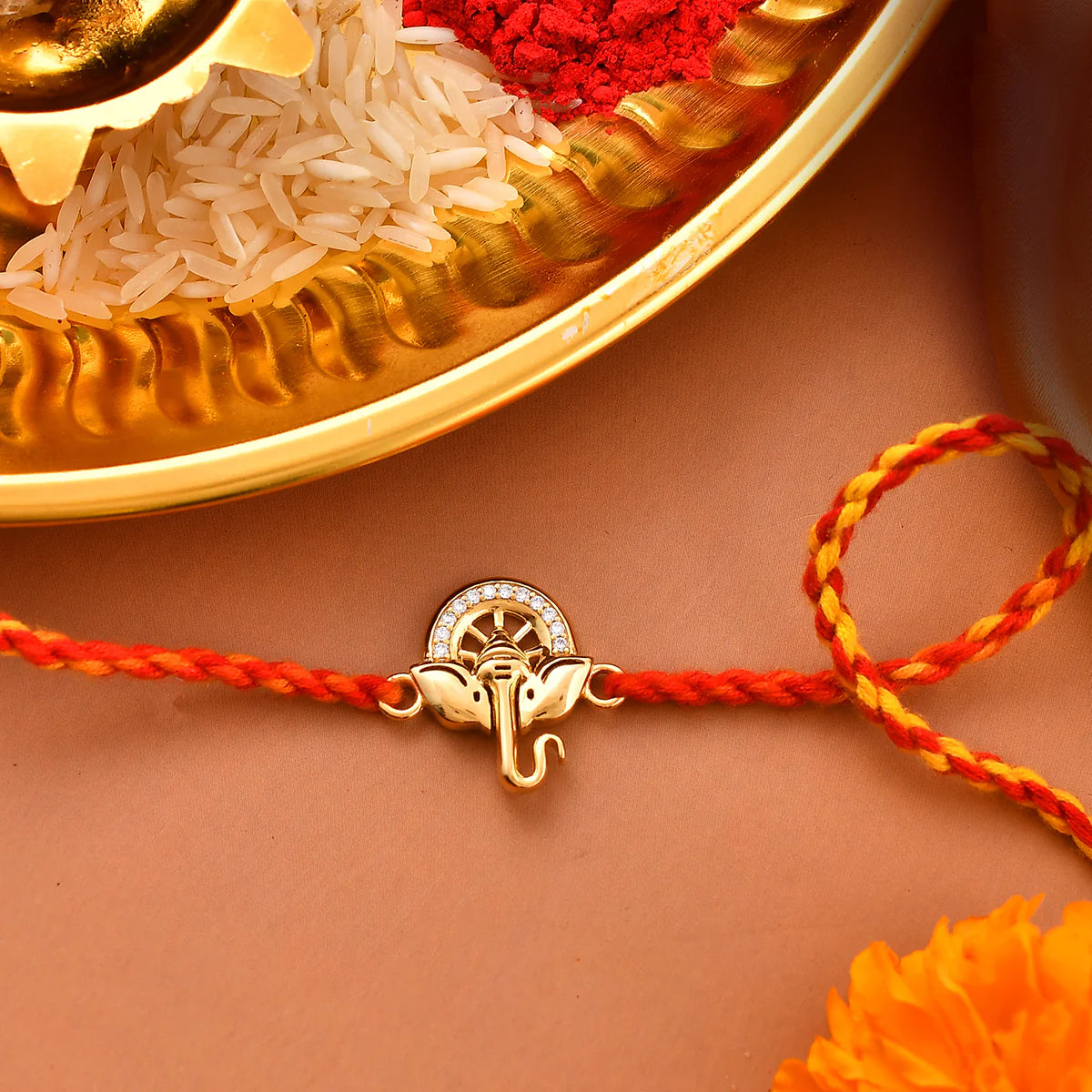 trueBrowns X Voylla 925 Sterling Silver Ganesha Gold-Polished Gold Micron Plated Thread Rakhi | Swadesiicart