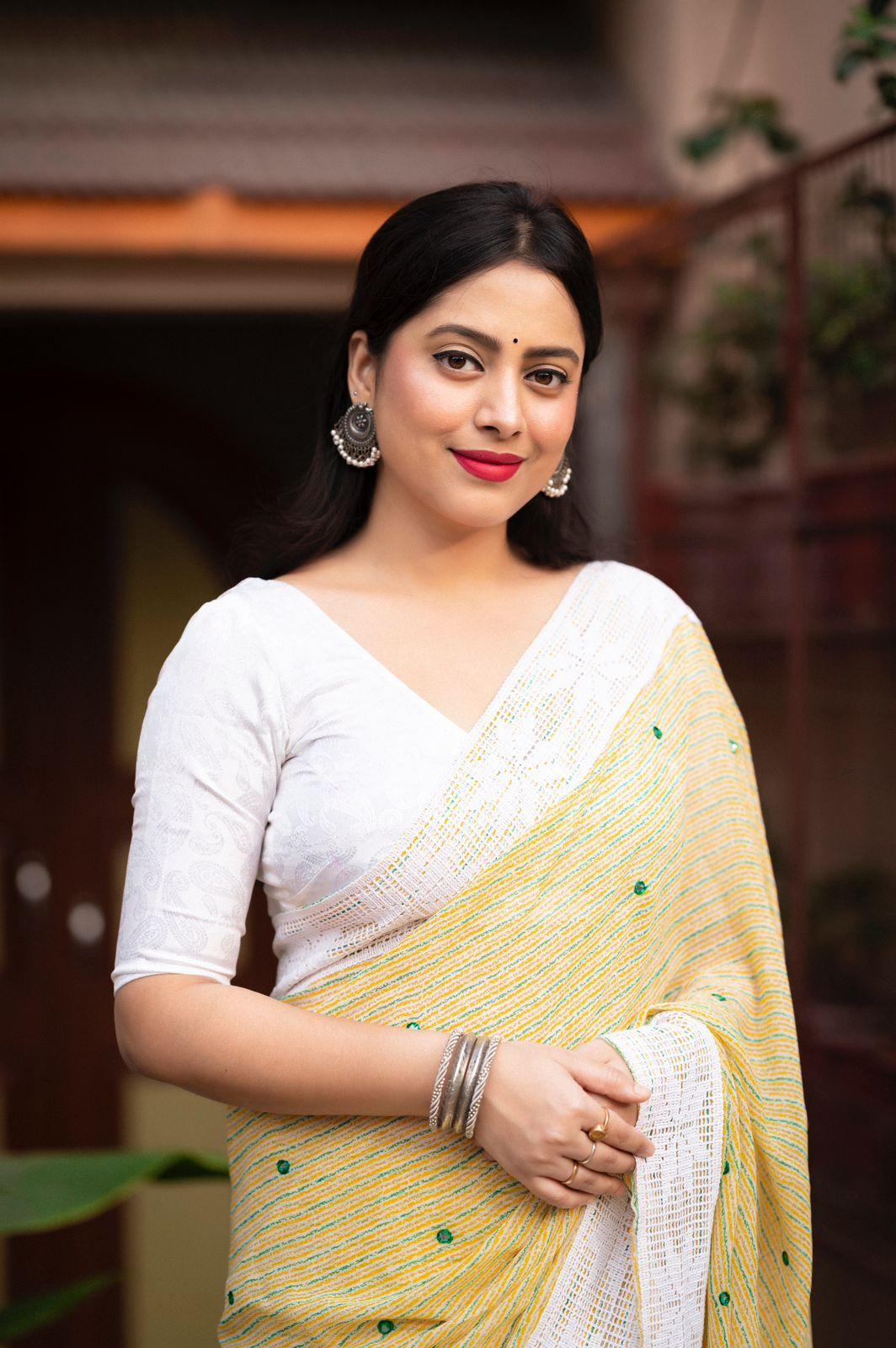 Lemon Poly Georgette Ethnic Motifs Saree with Unstitched Blouse - Hiral Fashion | Swadesiicart