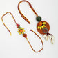 NVR Women & Men Set of 2 Multicolor Sea Shell Handcrafted Bhaiya Bhabhi Rakhi With Roli Chawal & Chocolate | Swadesiicart