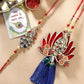 NVR Women & Men Set of 2 Gold-Toned Peacock Design Stone-Studded Bhaiya Bhabhi Rakhi With Roli Chawal | Swadesiicart