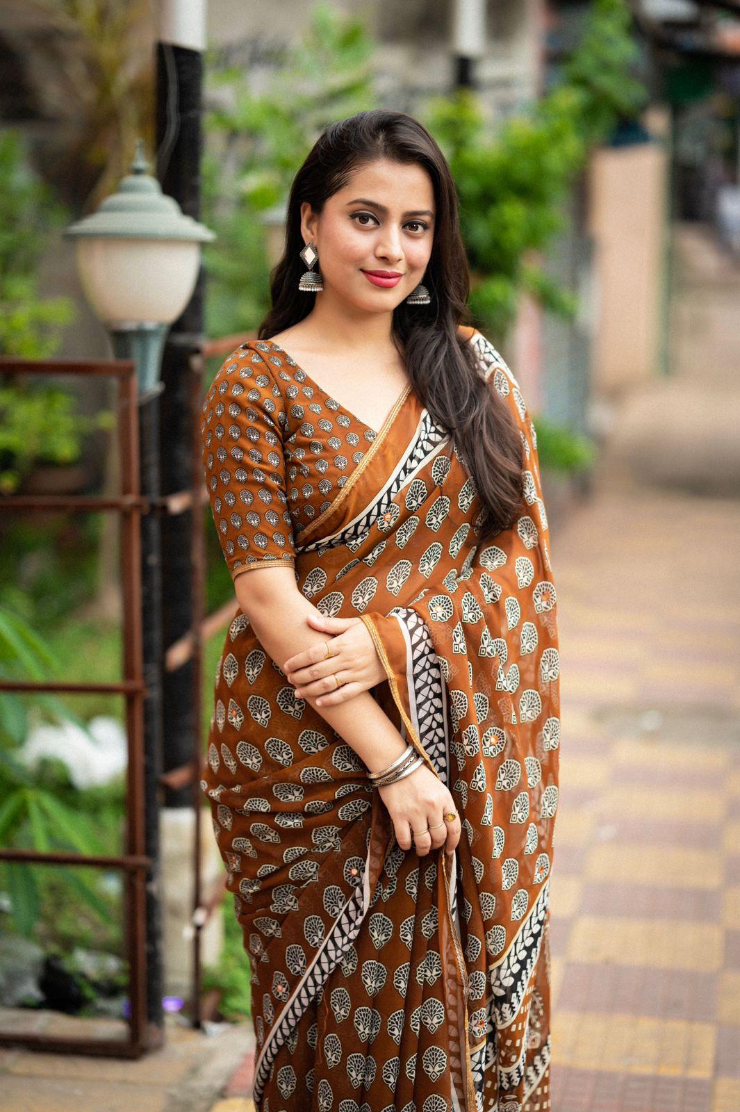 Mustard Poly Georgette Ajrak Saree with Unstitched Blouse - Hiral Fashion | Swadesiicart