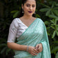Green Poly Georgette Woven Design Saree with Unstitched Blouse - Hiral Fashion | Swadesiicart