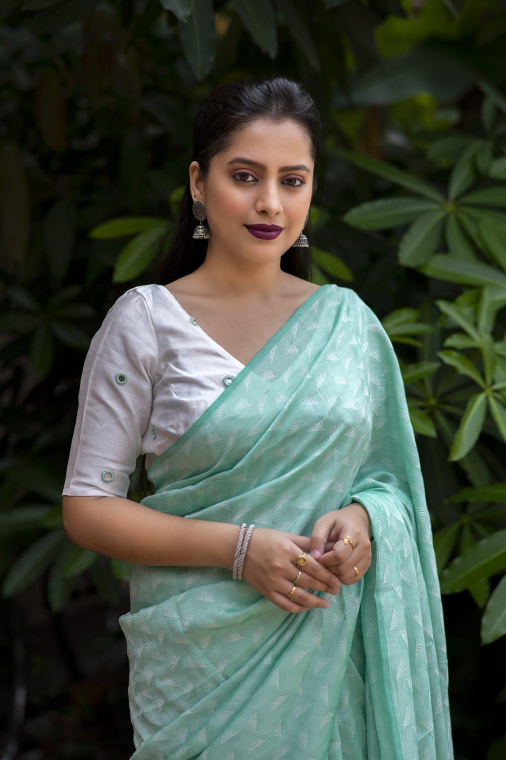 Green Poly Georgette Woven Design Saree with Unstitched Blouse - Hiral Fashion | Swadesiicart