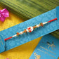 White Pearl Beads Rakhi & Laddu Hamper Combo | Swadesiicart