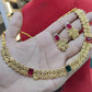 Jewel City Designer Gold Floral Necklace Set with Ruby Green Stones Elegant Matt Gold Finish Jewelry Set for Women | Swadesiicart