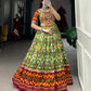 Lorenvalley Green Tussar Silk Patola Print With Foil Work And Original Mirror Gamthi Lace Lehenga Choli with Dupatta | Swadesiicart
