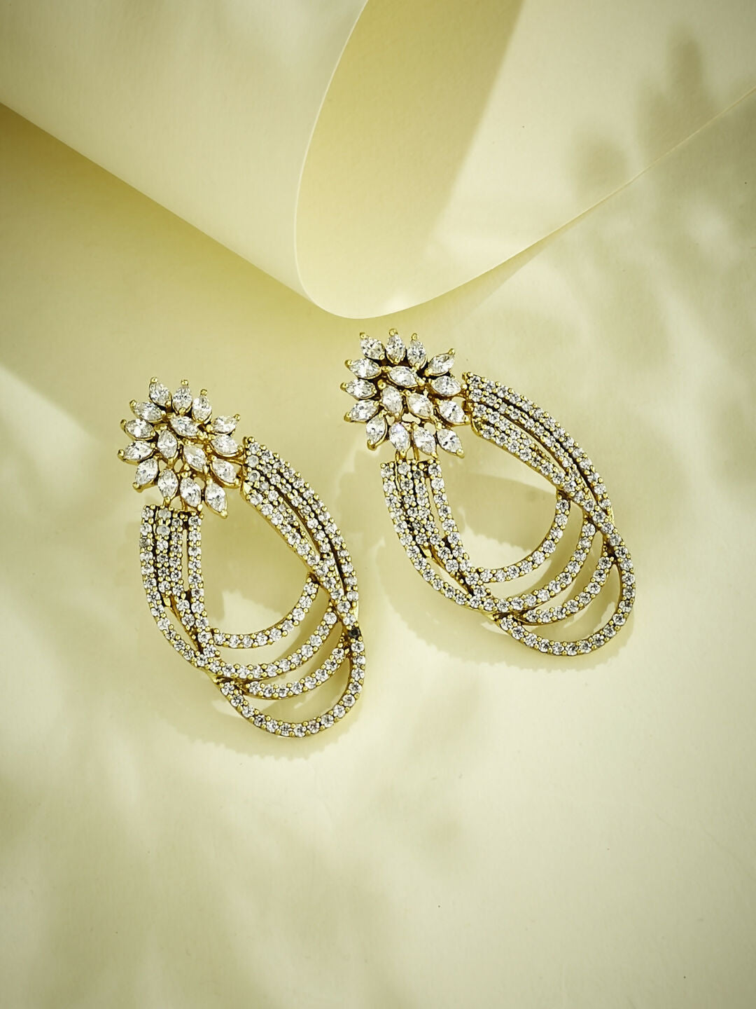Nuyug 22K Gold-Plated Floral Motif Zircon Stone Studded Teardrop Shaped Elegant Drop Dangler Earrings | Swadesiicart