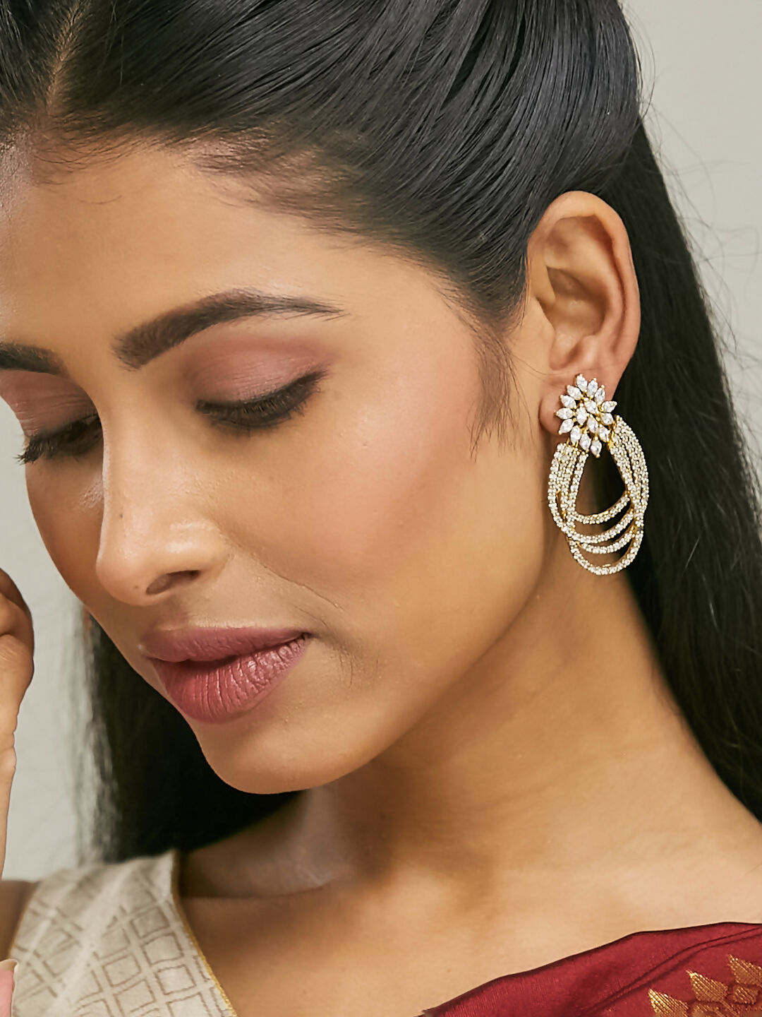 Nuyug 22K Gold-Plated Floral Motif Zircon Stone Studded Teardrop Shaped Elegant Drop Dangler Earrings | Swadesiicart