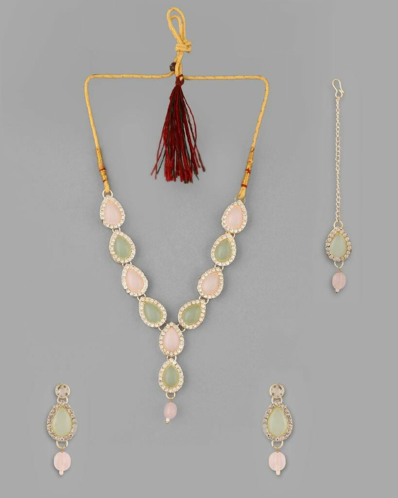 VOJ Gold-Polished Nude Pink And Mint Green Stone Studded Jewellery Set With Maang Tikka - VOJ (Valley Of Jewellery)
