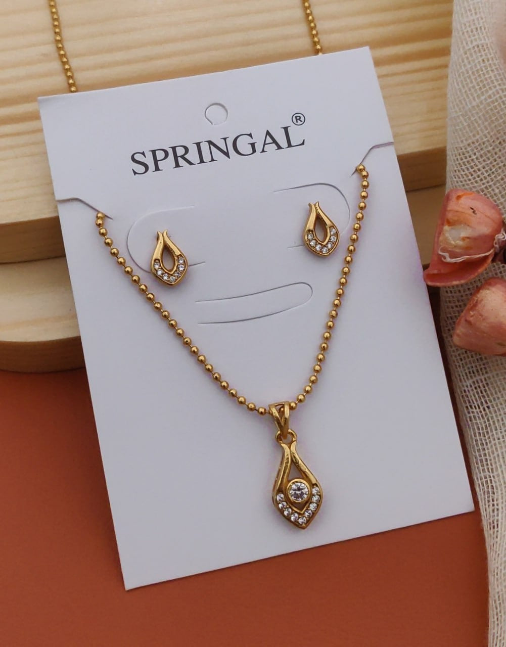Fancy Gold-Polished Partywear Chain And Pendant Set By House of Ree | Swadesiicart