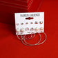 Gold-Polished Alloy Set Of 9 Designer Earrings - The Pari - Swadesiicart