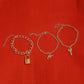 Gold-Polished Alloy Gold Charm Bracelet Set - The Pari - Swadesiicart