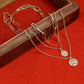 Gold-Polished Alloy Layered Designer Short Necklace - The Pari | Swadesiicart