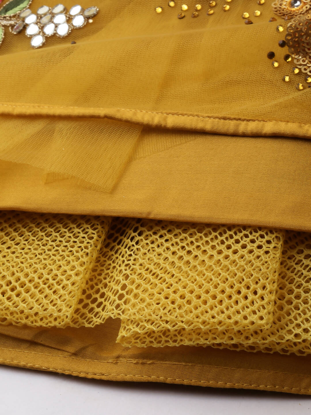 House of Panchhi Mustard Net Semi stitched Coding, Sequins & Saroski Stone Work Lehenga Choli | Swadesiicart