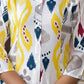 Juniper Women's Yellow Ikat Printed Liva Rayon Kurta With Button Closure - Swadesiicart