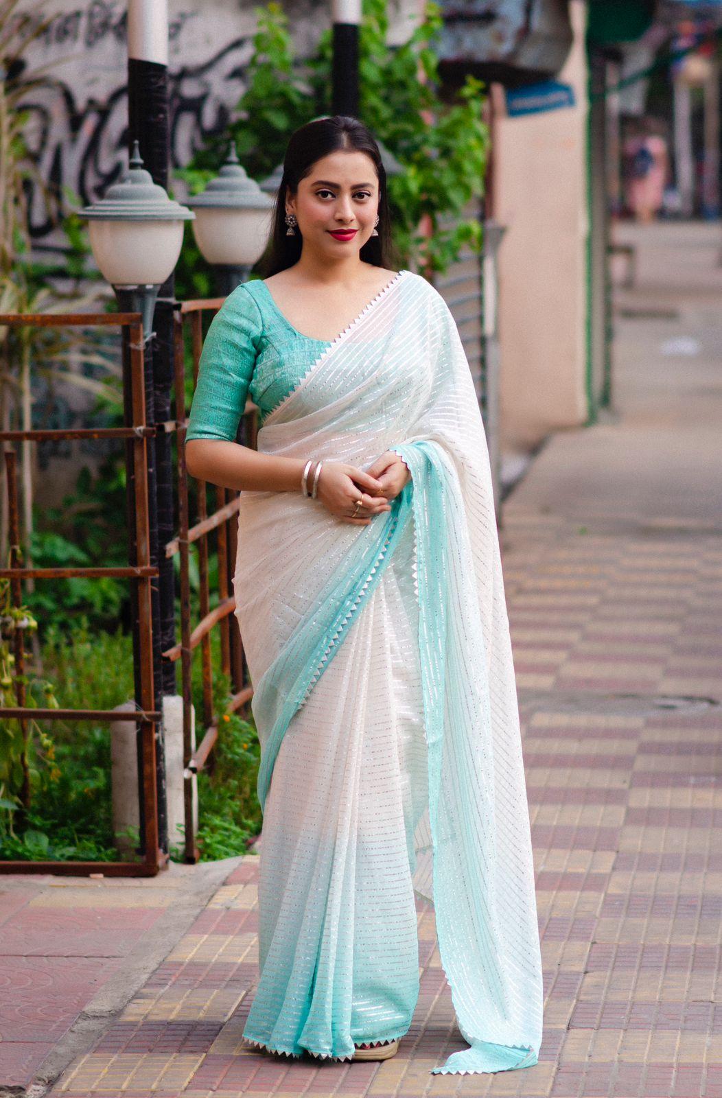 Green Poly Chiffon Striped Saree with Unstitched Blouse - Hiral Fashion | Swadesiicart