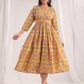 Janasya Gathered Cambric Mustard Ethnic Motifs V-Neck Dress | Swadesiicart
