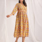 Janasya Gathered Cambric Mustard Ethnic Motifs V-Neck Dress | Swadesiicart