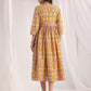 Janasya Gathered Cambric Mustard Ethnic Motifs V-Neck Dress | Swadesiicart