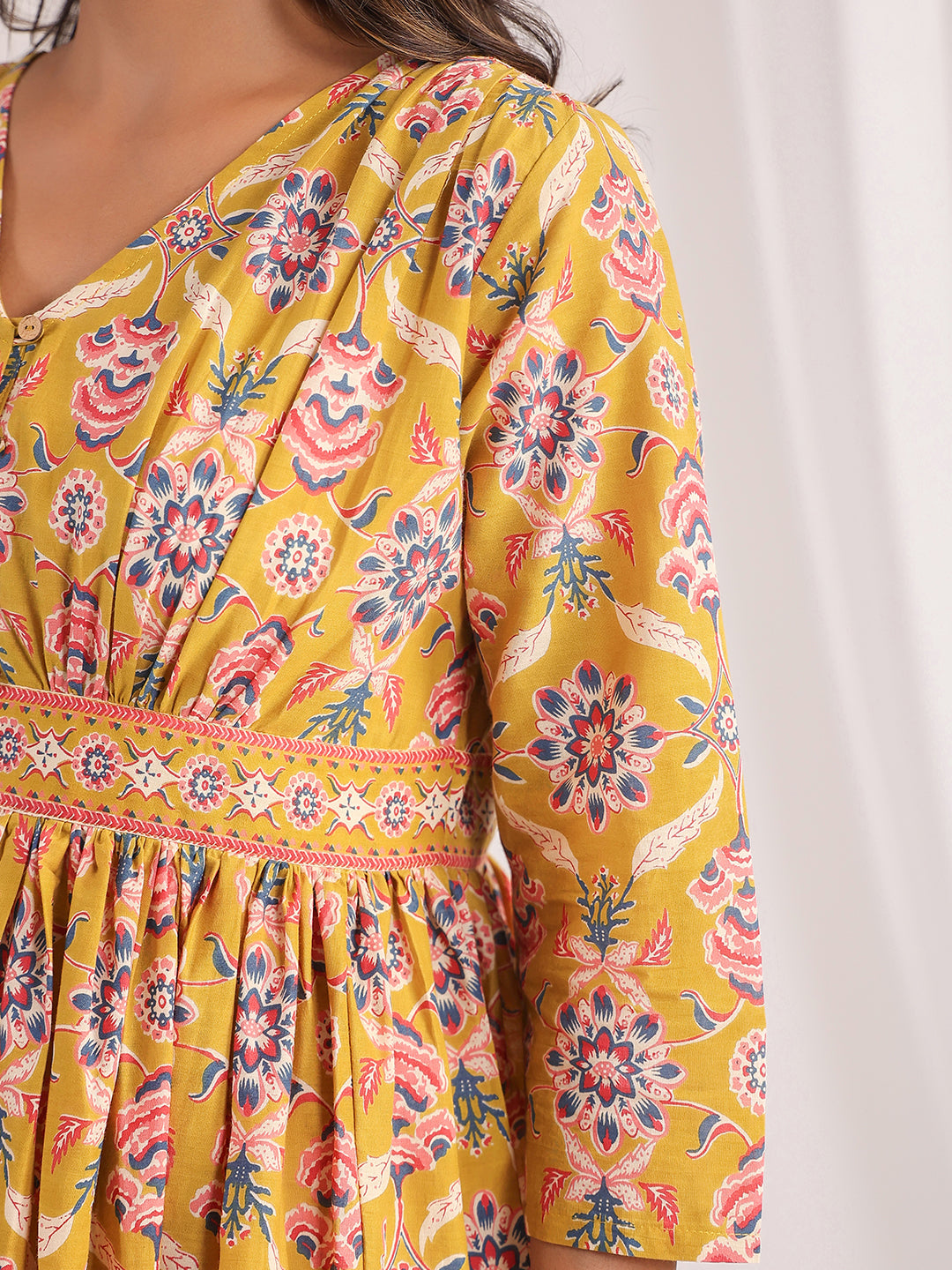 Janasya Gathered Cambric Mustard Ethnic Motifs V-Neck Dress | Swadesiicart
