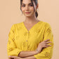Janasya Mustard Cotton Schiffli A-Line Tunic | Swadesiicart