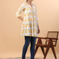 Janasya Pleated Cambric White Ikkat Notch Neck Tunic | Swadesiicart