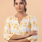 Janasya Pleated Cambric White Ikkat Notch Neck Tunic | Swadesiicart