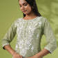 Janasya Regular Cambric Sage Embroidered Round Neck Tunic | Swadesiicart