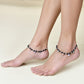 Jewels Nest Traditional Silver-Plated Black Beaded Anklet with Floral Charms | Swadesiicart