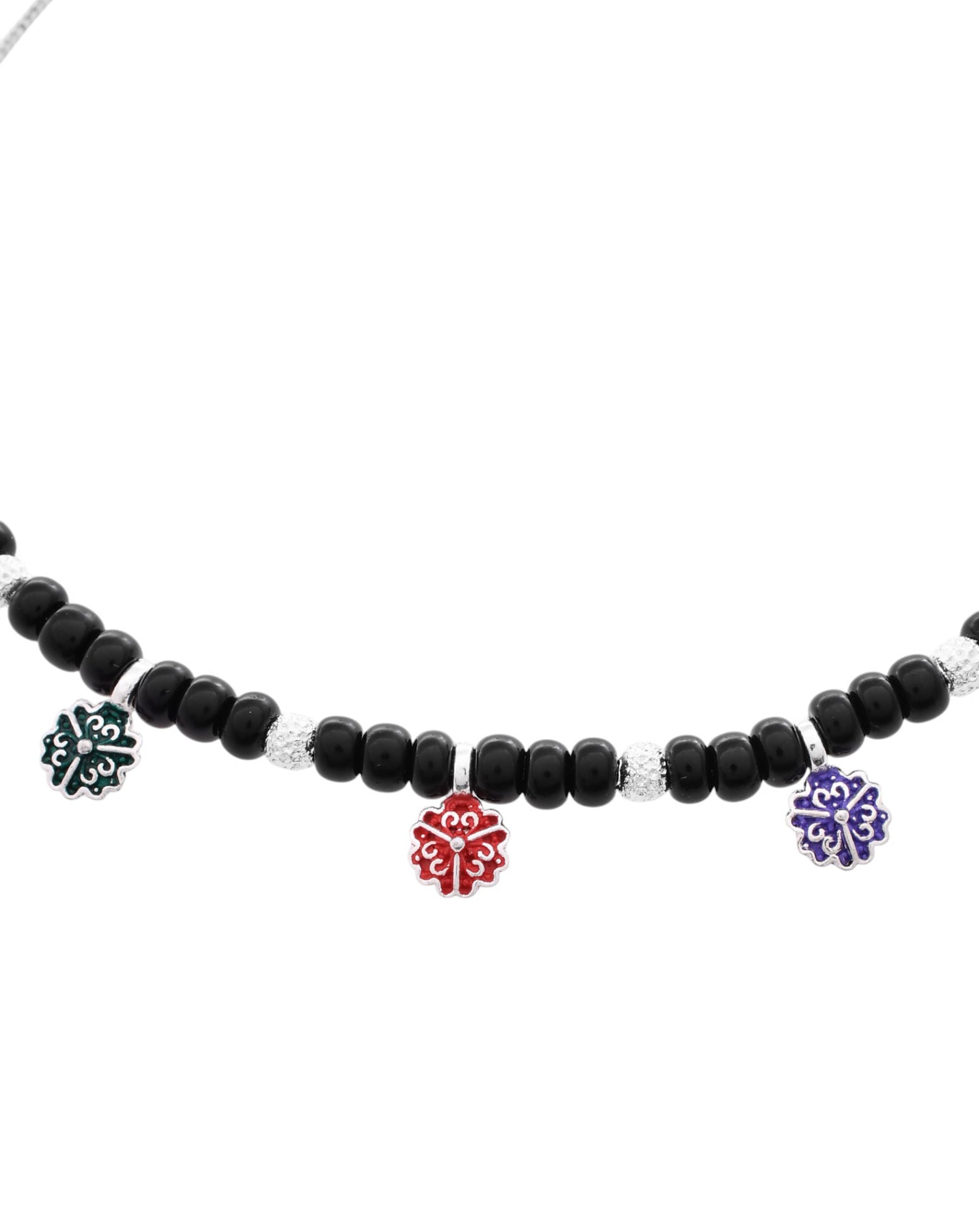Jewels Nest Traditional Silver-Plated Black Beaded Anklet with Floral Charms | Swadesiicart