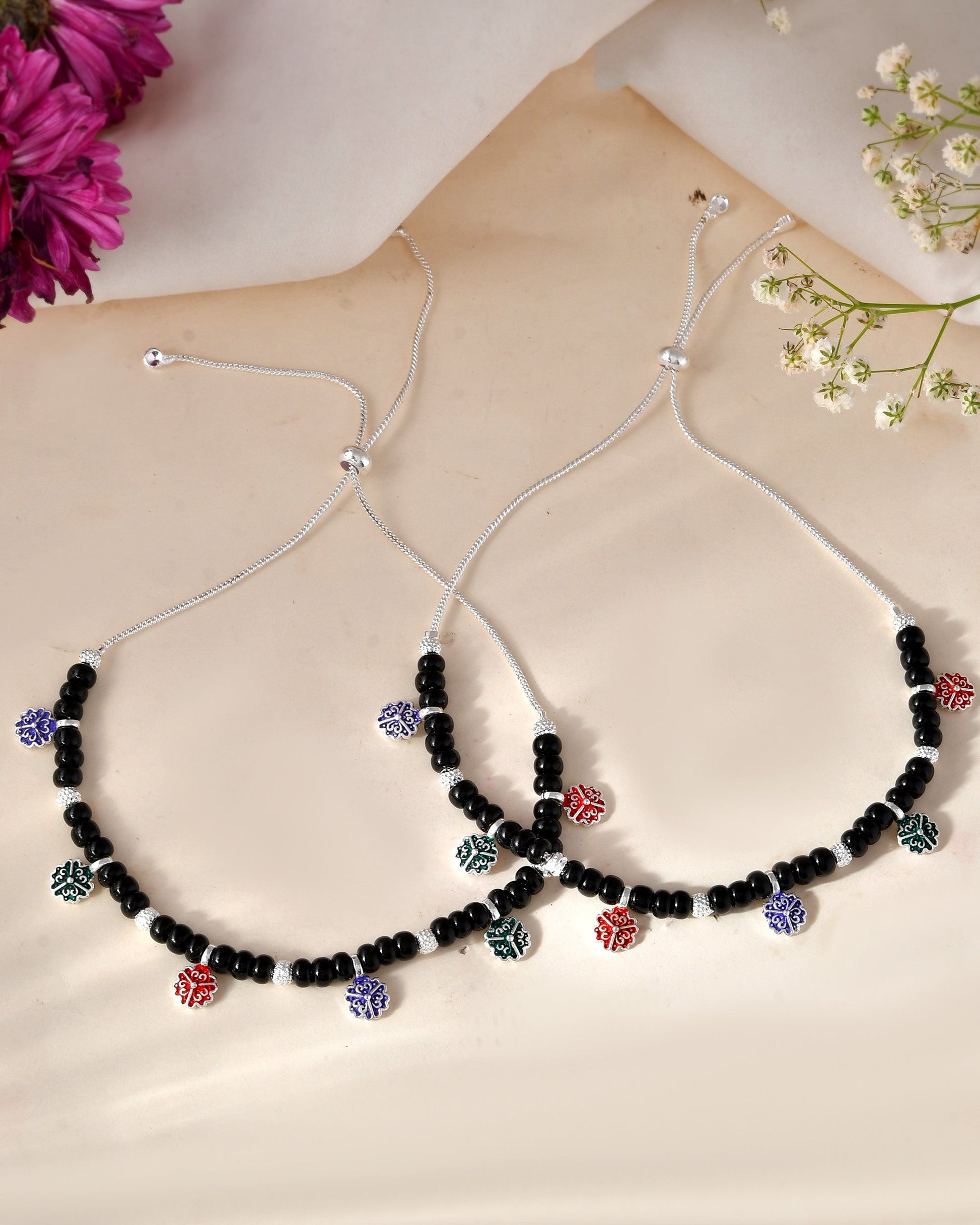 Jewels Nest Traditional Silver-Plated Black Beaded Anklet with Floral Charms | Swadesiicart