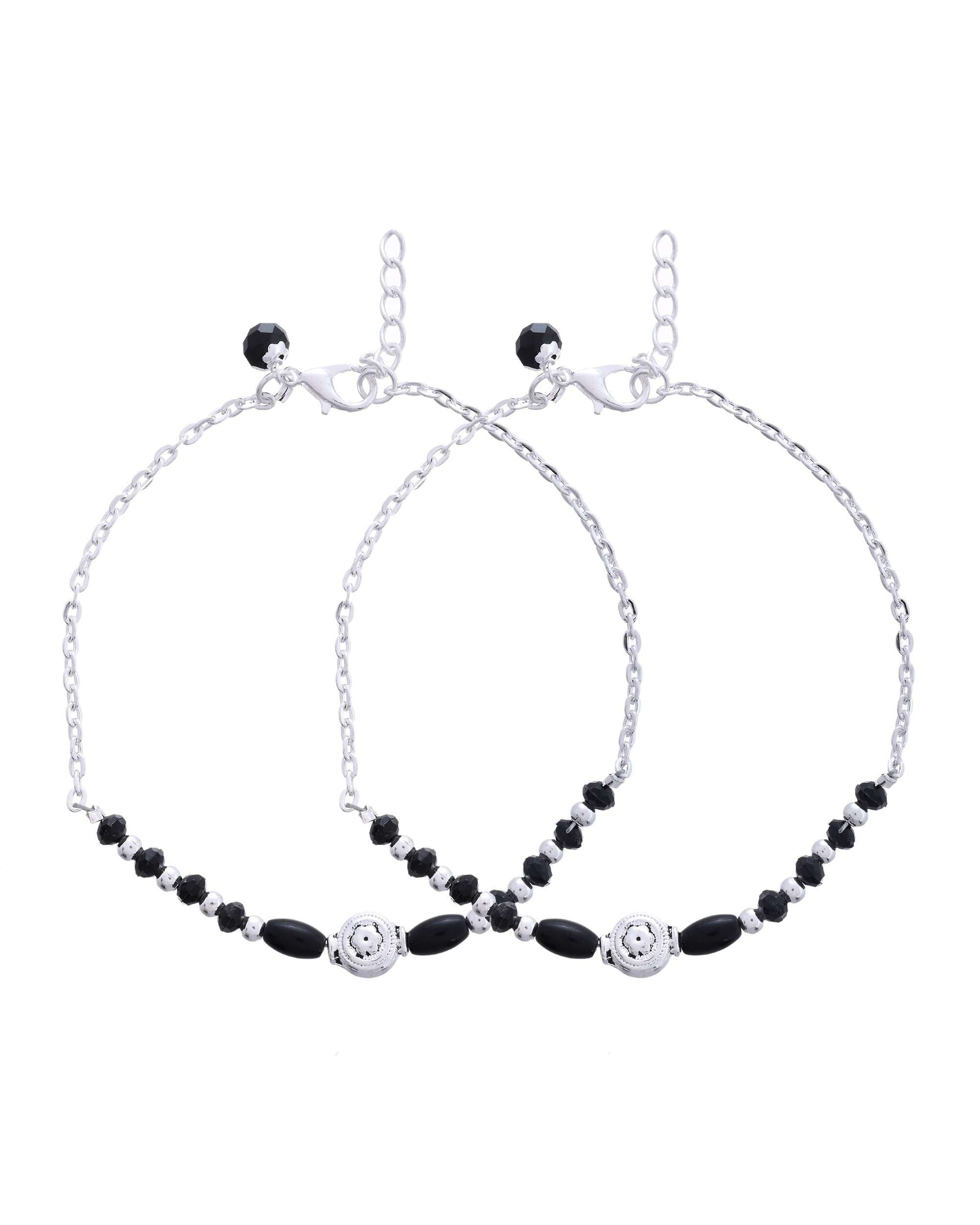 Jewels Nest Set of 2 Silver-Plated Stainless Steel Beaded Anklets with Artificial Black Stones & Floral Charms - Swadesiicart