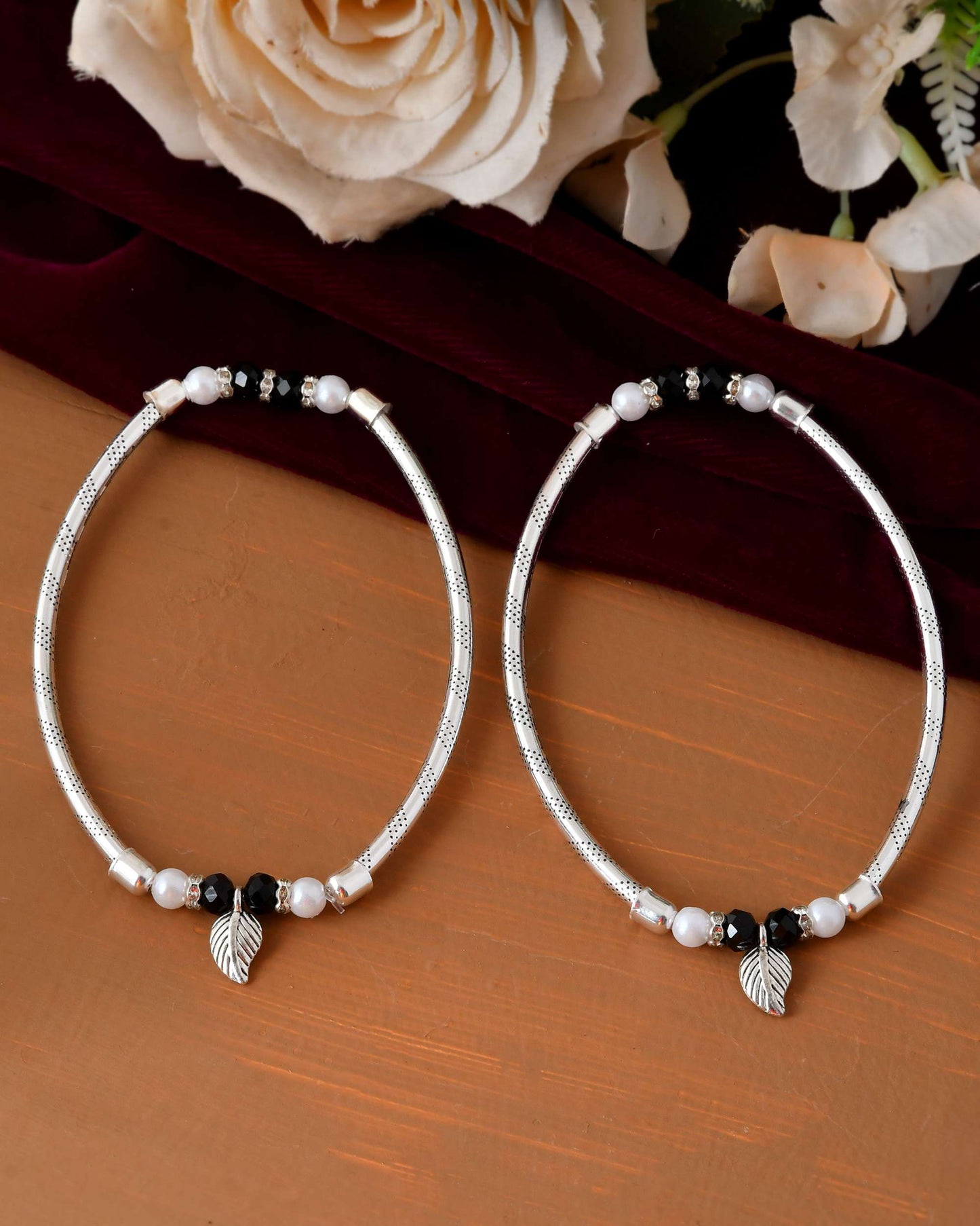 Jewels Nest Set of 2 Silver-Plated Black & White Beaded Anklets with Leaf Charm - Swadesiicart